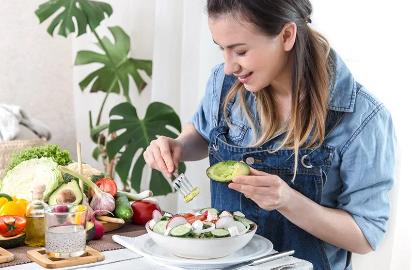 Someone eating a salad